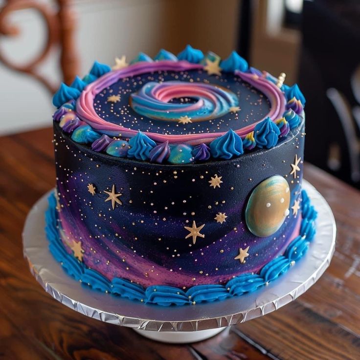 a colorful cake with stars and planets on it