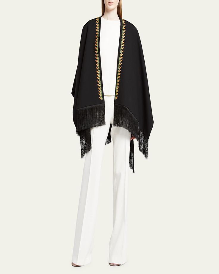 Etro Mantella shawl in wool    Features embroidered accents     Open front     Side vents     Asymmetrical hem     Fringe trim     Dry clean    Made in Italy Elegant Embroidered Fall Shawl, Elegant Embroidered Shawl For Fall, Elegant Fall Shawl With Tassels, Fringe Shawl, Fabric Scarf, Embroidered Scarf, Embroidered Wool, Cashmere Shawl, Fringe Scarf