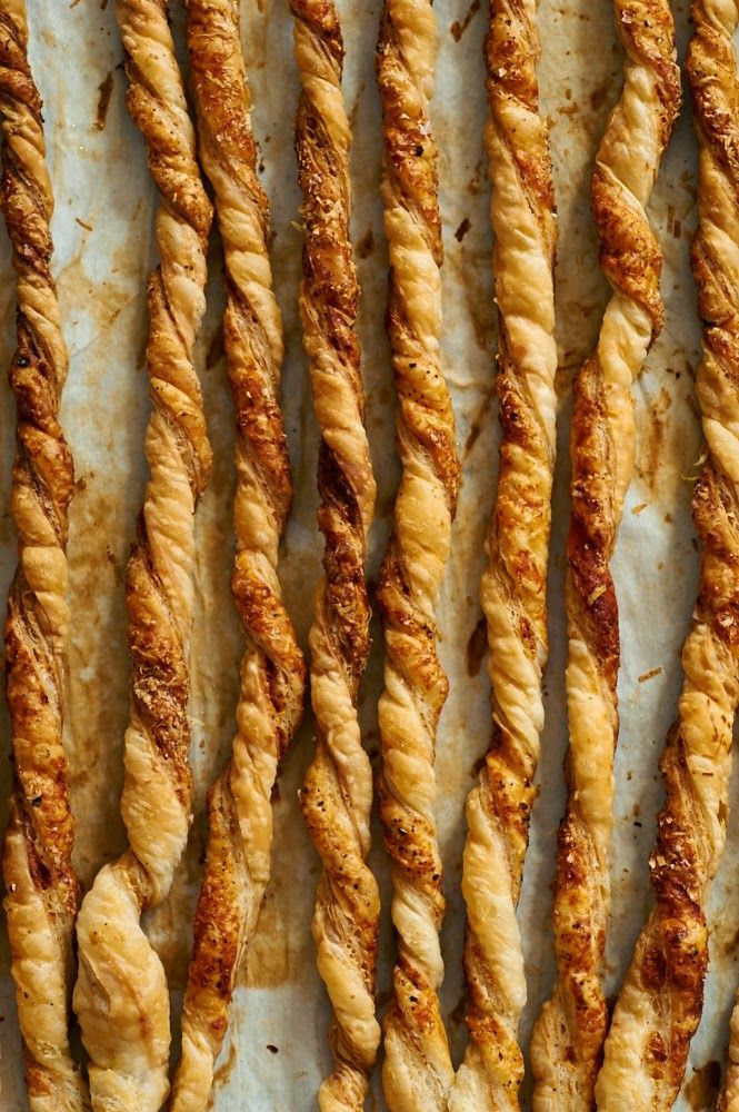 several twists of bread sitting on top of a pan