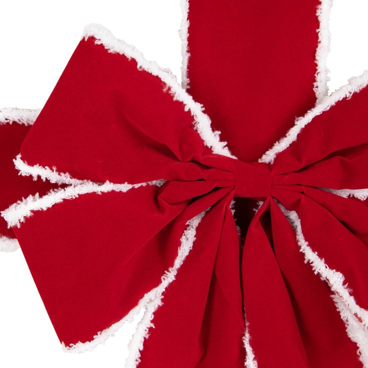 a red and white bow tied to the side of a christmas tree ornament