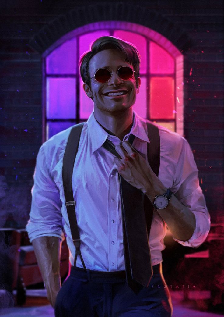 a man wearing sunglasses and suspenders standing in front of a window with his hands on his chest