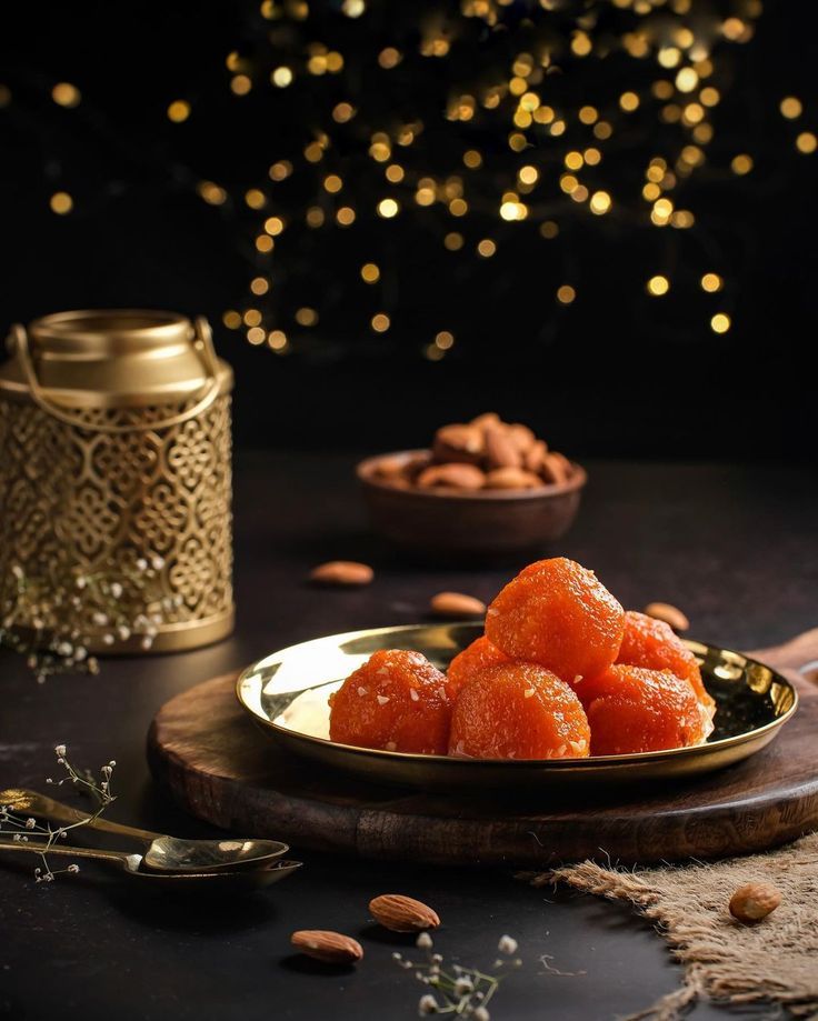 some kind of food on a plate with nuts and other items around it in the background