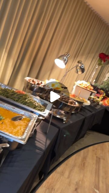 a buffet table is set up with many different foods