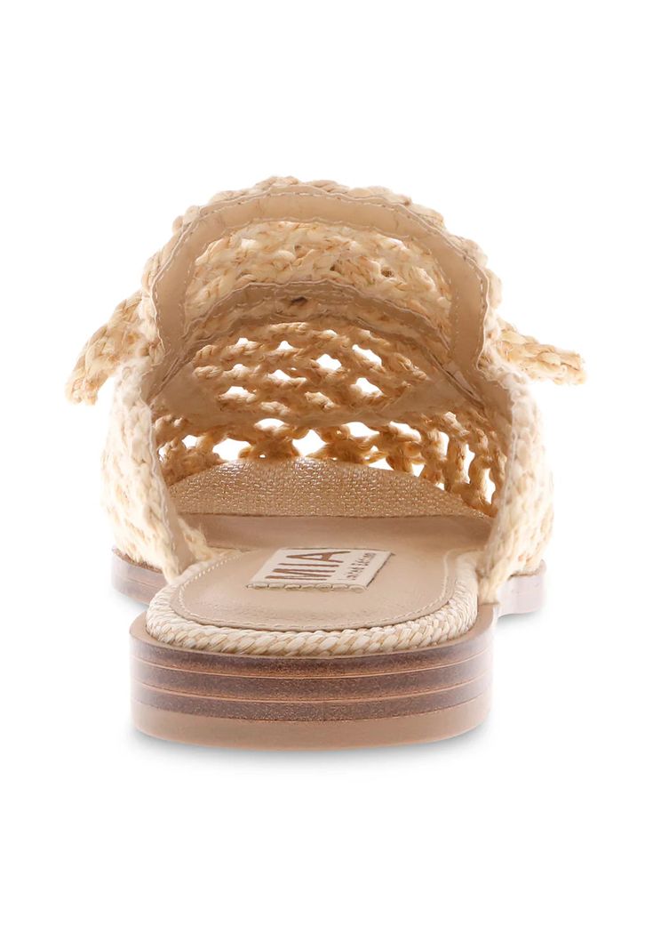 MIA Step into summer with the stylish Layce Woven Raffia Mule! With its modern mule design, half inch stacked heel, and square toe, this limited edition slide offers a timeless and chic look. Made with natural woven raffia, it's the perfect shoe for spring and summer! (Note: We can't guarantee you won't want to wear these every day.) This style runs large, so we recommend sizing down! Woven Raffia, Timor Leste, Perfect Shoes, Toe Designs, Turks And Caicos, Mozambique, Turks And Caicos Islands, Stacked Heel, Chic Look