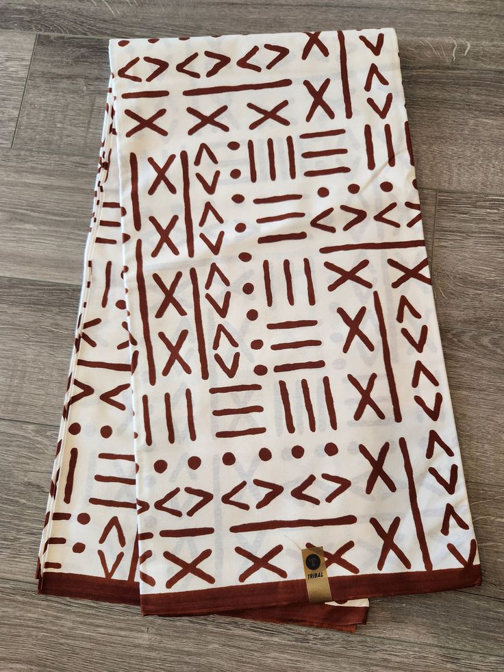 Brown and Off White Tribal Ankara Fabric in 3yards and 6yards. This is fabric is sold by the fold and each fold is approximately a yard.  This fabric is 100% cotton and has a width of 44in.  It can be used make different clothing, quilting and other sewing projects. If you purchase more than a yard, it will come in a continuous piece We ship via USPS Priority mail or UPS Ankara Fabric African Textiles, Print Fabric Design, African Motifs, African Batik Fabric, African Quilts, Ideas For Tattoos, Head Wrap Headband, African Ankara, African Textiles