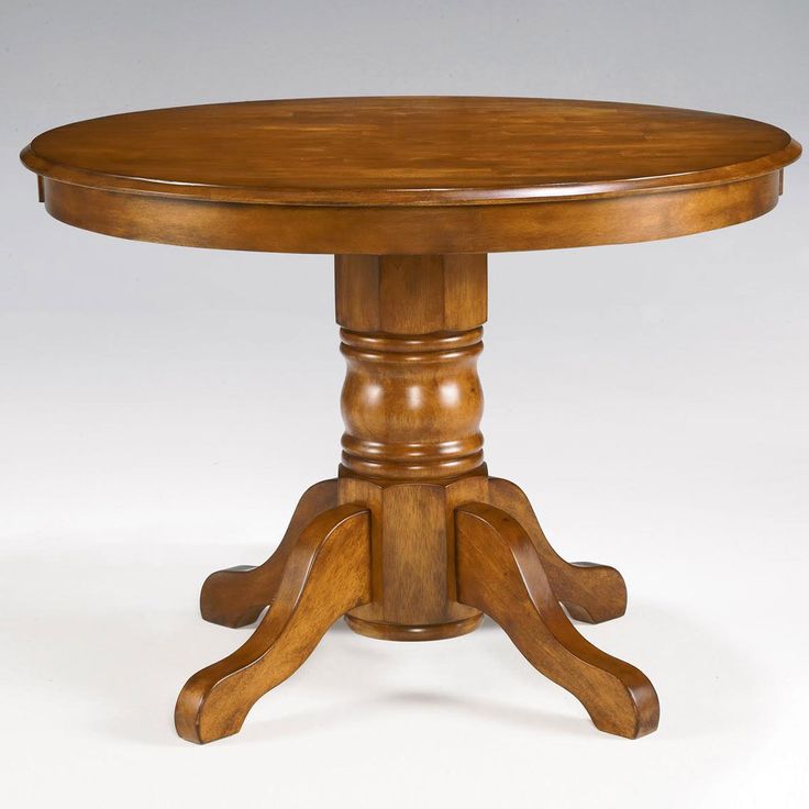 a round wooden table with four legs on an isolated white background for use as a centerpiece