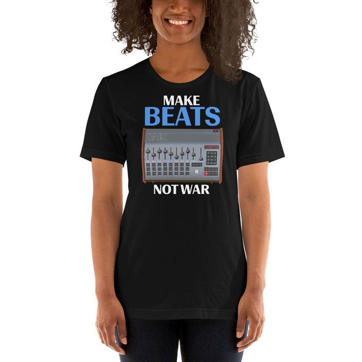 DMX "Make Beats Not War" Unisex T-Shirt Embrace nostalgia with this "Make Beats Not War" DMX inspired design. This vintage drum machine t-shirt sports a humorous twist, effortlessly blending the old-school charm with an upbeat message. A perfect choice for beat enthusiasts and vintage drum machine lovers alike. Additional Information This t-shirt is everything you've dreamed of and more. It feels soft and lightweight, with the right amount of stretch. It's comfortable and flattering for all. • 1 Charm School, Drum Machine, Vintage Drums, Black White Red, Lowest Price, 30 Day, Old School, Fabric Weights, Design Inspiration