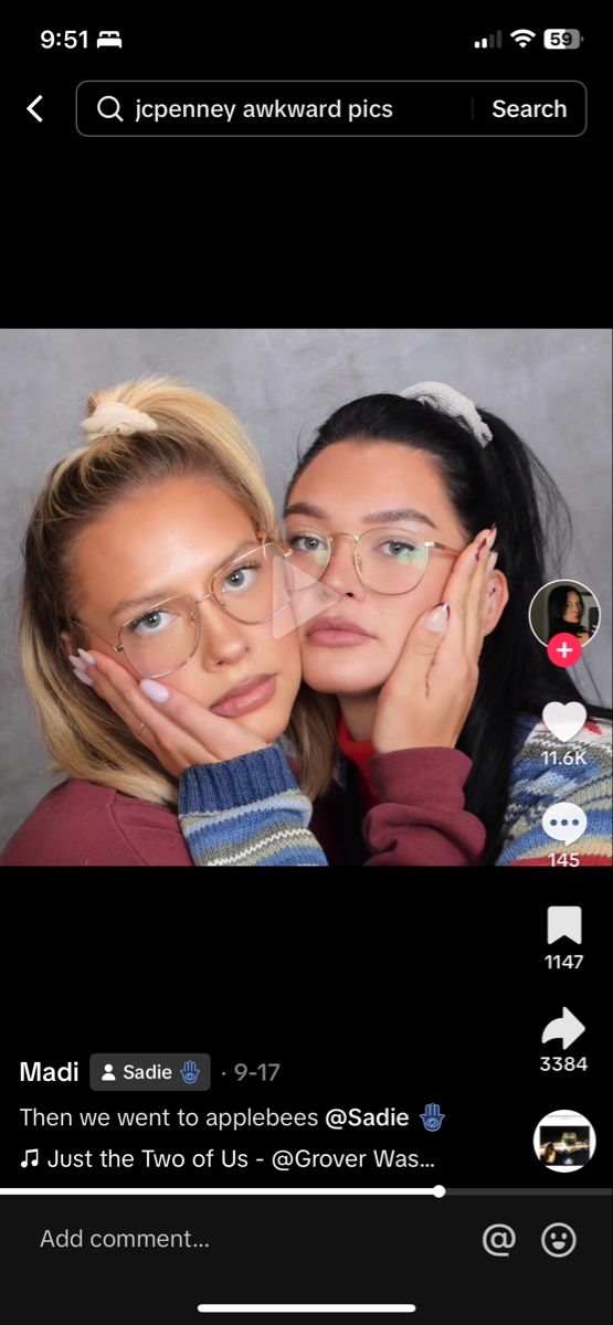 two women with glasses and one has her hand on her face, while the other is holding