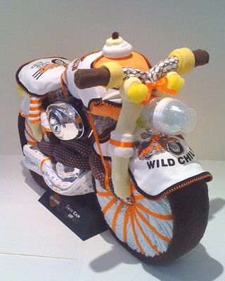 a close up of a motorcycle made out of cloths and other items on a table