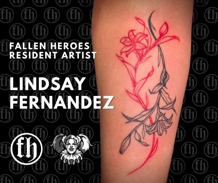 a woman's leg with flowers on it and the words, fallen heros resident artist