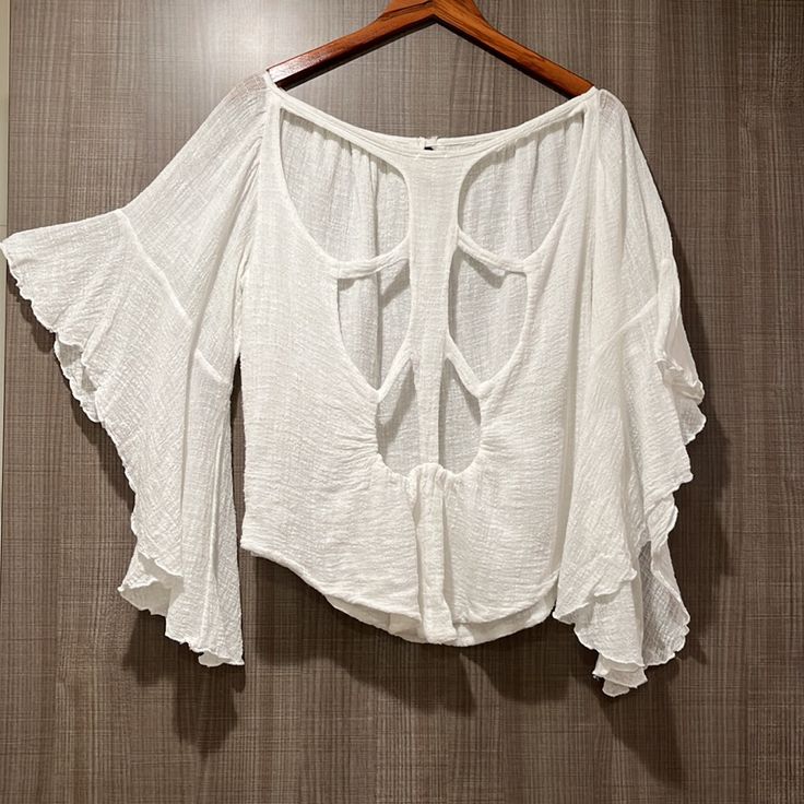 - White Color - Flared Bell Sleeves - Slightly Sheer Fabric - P.S. On The Left Side Shoulder Has Little Tiny Stains/Pulled (Please See Last Photo) - 100% Cotton - Machine Wash Cold - Size M (Measurements Lying Flat, Please See Photos For Measurement) - New Without Tag, In Excellent Condition Bohemian Ruffle Tops For Day Out, Bohemian Ruffled Tops For Day Out, Flowy White Top For Beach Cover-up, Summer Beach Peasant Top With Ruffles, Summer Beach Cover-up Flowy Blouse, Summer Cotton Flowy Blouse, Chic Flowy Top For Beach Cover-up, Flowy Cotton Blouse For Summer, Flowy Ruffled Tops For The Beach