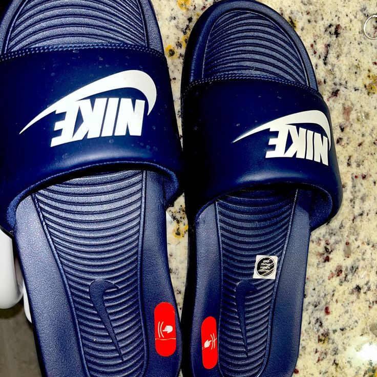 Navy Blue Victori Men’s Slides. Size 11. Does Not Come In Original Box, Brand New. Never Worn Outside. And Once Inside To Try On. To Big, And My Feet Are On The Wider Side. Only For Narrow Feet. Nike Shoes Men, Mens Nike Shoes, Shoes Men, Flip Flop Sandals, Try On, Nike Shoes, Nike Men, Flip Flops, Original Box