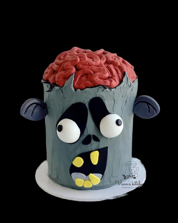 a cake that has been decorated to look like a monster