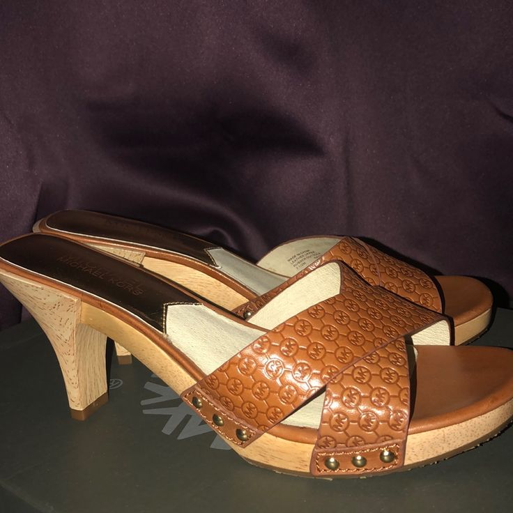 Never Worn, Though Missing Tags And Box Currently. Perfect Condition. 100% Authentic, Size 7.5. Elegant Open Toe Clogs With 4-inch Heel, Designer Sandals With Wooden Block Heel, Designer Heels With Wooden Open Heel, Designer Open Toe Mules With Wooden Heel, Designer Open Toe Heels With Stacked Heel, Designer Sandals With Wooden Heel, Elegant Open Toe Clogs With Padded Heel, Elegant Slip-on Heels With Wooden Heel, Designer Open Toe Sandals With Stacked Heel