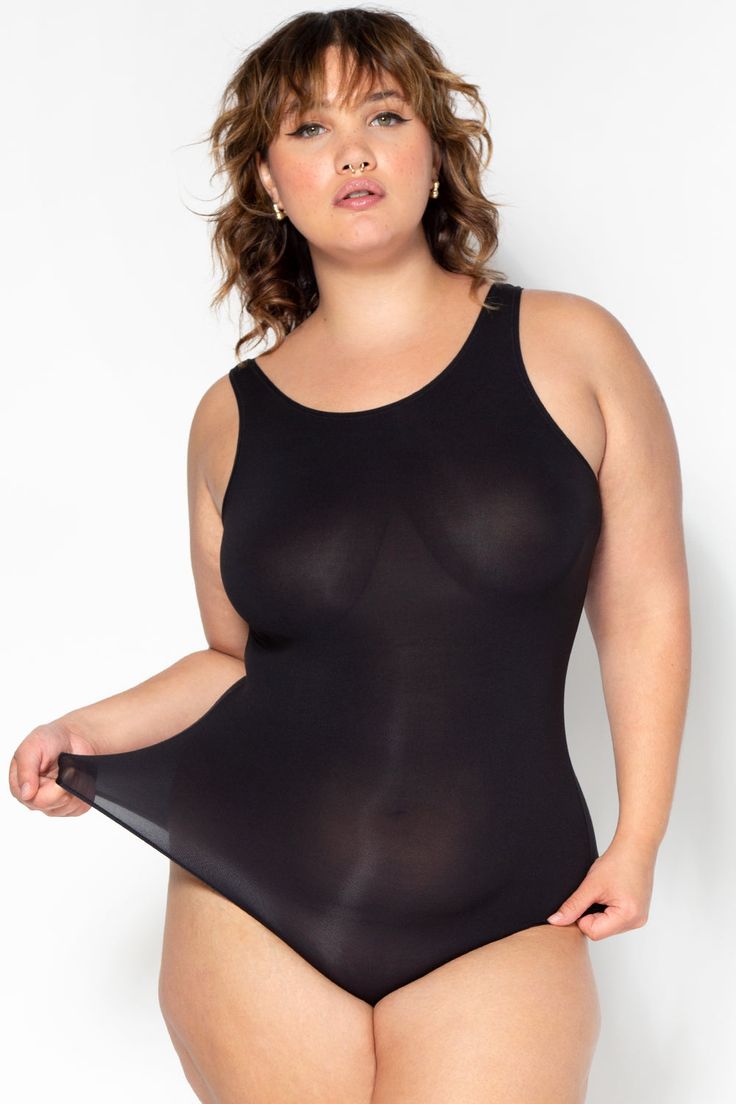 Find comfort in your everyday wear with the Naked Scoop Bodysuit. It is buttery-soft, oh-so smooth and your new go-to foundation piece. This bodysuit is designed as an elevated essential with a barely there feel. The Smart & Sexy Naked Scoop Bodysuit is perfect for styling as loungewear or layered underneath your favorite wardrobe pieces. Inspired by a classic muscle tank fit, this slightly fitted bodysuit features a high scoop neckline. A semi-cheeky bottom offers just the right amount of back Vintage Bustier, Busty Fashion, Wardrobe Pieces, Bodysuit Black, Mesh Bodysuit, Bodysuit Lingerie, Babydoll Lingerie, Muscle Tank, Black Bodysuit