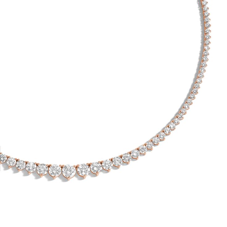 Designed with comfort in mind, the 18 Carat Graduated Tennis Necklace is handmade to be fluid, not rigid, allowing it movement for comfortable wear. It features prong-set brilliant round diamonds ascending in size as it reaches the center of the necklace. Rose Gold Brilliant Cut Tennis Necklace For Anniversary, Anniversary Rose Gold Brilliant Cut Tennis Necklace, Rose Gold Diamond Tennis Necklace For Formal Occasions, Formal Rose Gold Tennis Necklace With Diamond Cut, Formal Rose Gold Diamond Cut Tennis Necklace, Classic Round Rose Gold Diamond Necklace, Classic Rose Gold Tennis Necklace For Formal Occasions, Classic Rose Gold Round Diamond Necklace, Formal Rose Gold Diamond Tennis Necklace