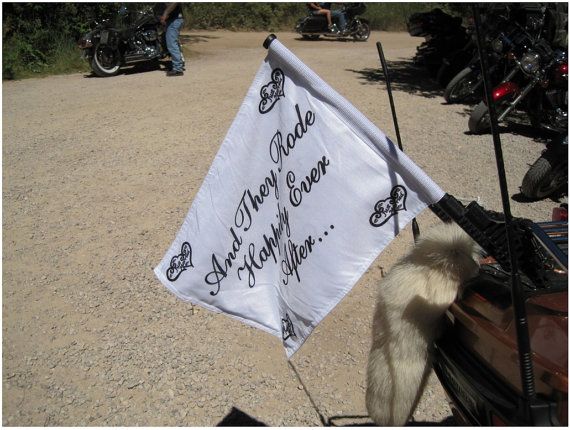 there is a sign on the back of a motorcycle