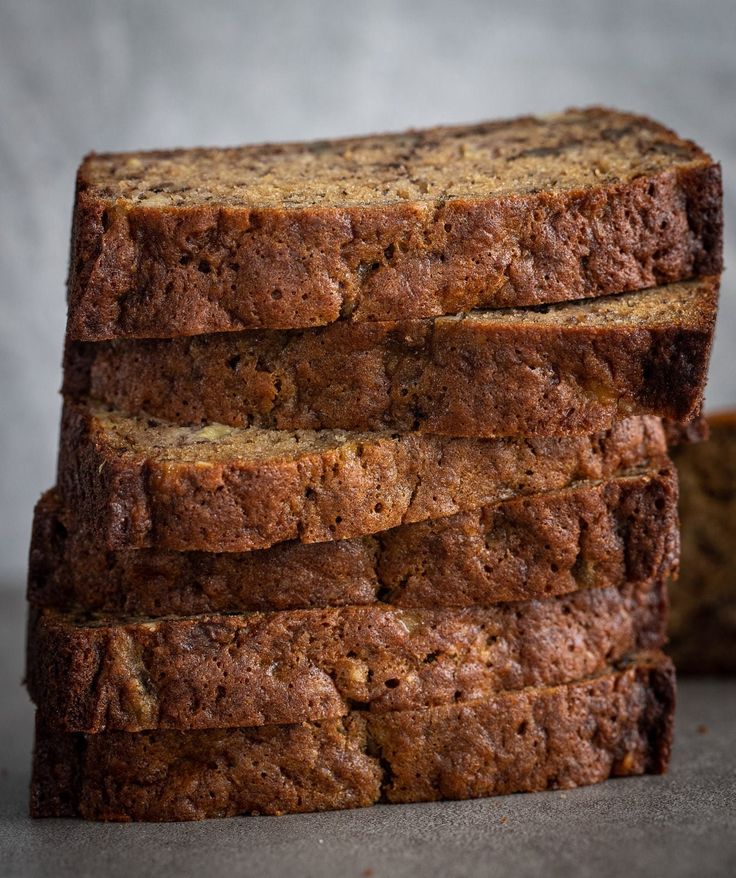 four slices of banana bread stacked on top of each other