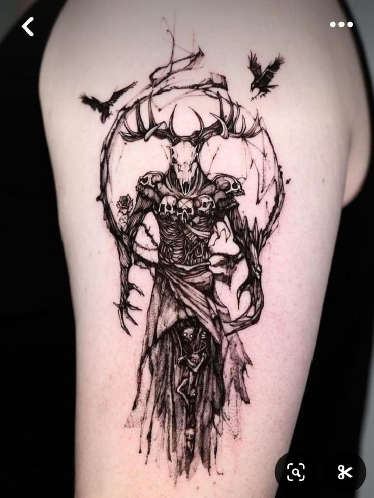 a tattoo on the back of a woman's shoulder with an image of a demon