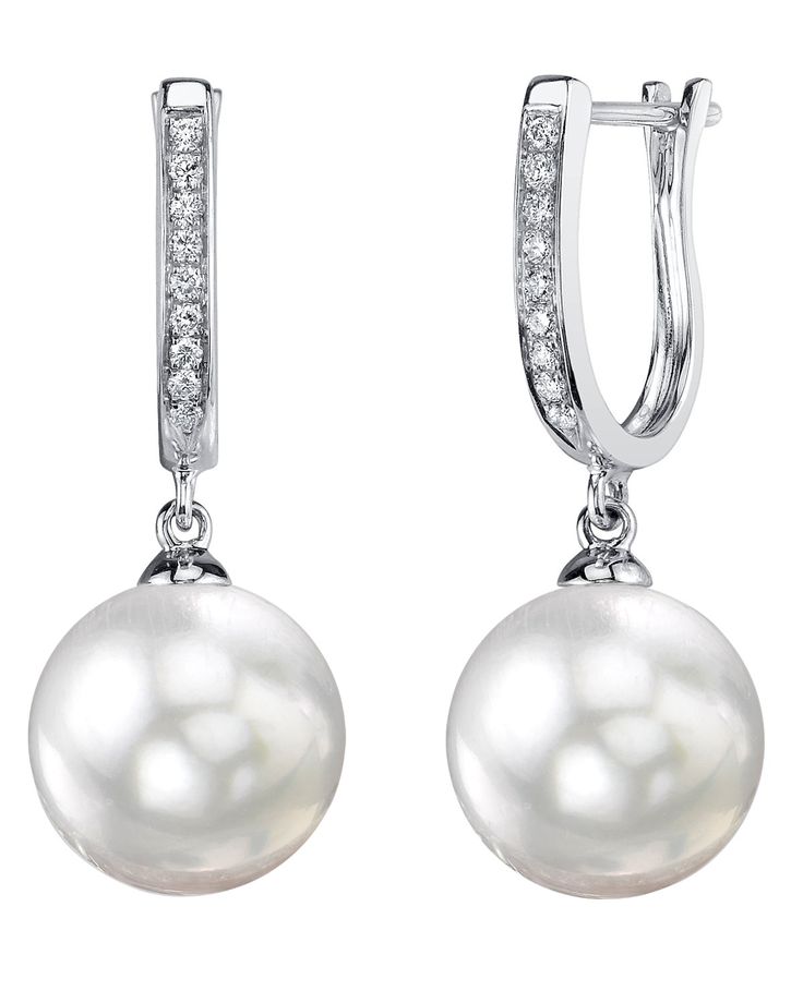 These exquisite pearl earrings feature two AAA quality, 9mm White South Sea pearls with 'Very High' luster (please see our pearl grading page for more information). All our White South Sea pearls are imported directly from the shores of Australia. The mountings are comprised of approximately 2.15 grams of the finest quality 14K gold and also include 0.1 carats of SI quality diamonds. All pearl earrings are approved by our staff of GIA pearl experts and come packaged in a beautiful jewelry box. P South Sea Pearls Earrings, Akoya Pearl Earrings, Single Pearl Necklace, White Pearl Bracelet, Mother Of Pearl Jewelry, Pearl Jewelry Wedding, White Pearl Necklace, Pearl And Diamond Earrings, Classic Earrings