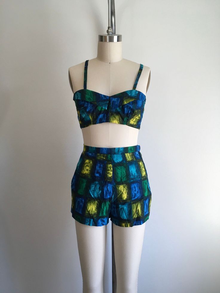 "My new favorite swimsuit! Vintage 50's / 60's bikini. Cotton fabric, hooks on top, metal zipper & button on shorts. Shorts are not lined. Bikini Top: Fit: Xs/Sm Bust: to 32\" Under bust: 28\" Condition: nothing noted. Bottoms: Fit: Xs/Sm Waist: tight 27\" Hip: 37\" Rise: 13.5\" Brand: Myers Condition: nothing noted. *All sales are final, please ask any questions before purchasing. *Each monitor shows color differently and it is subjective, please email me if you have questions concerning co 60s Swimsuit, Swimsuit Vintage, Modest Swim, Vintage Bathing Suits, Vintage Swimsuits, 50s Fashion, Costume Design, Printed Skirts, Vintage 1950s