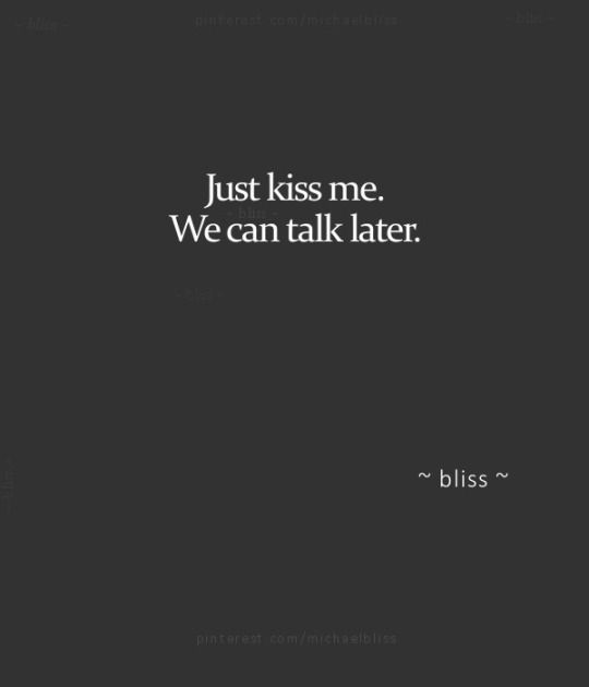 a black and white photo with the words, just kiss me we can talk later