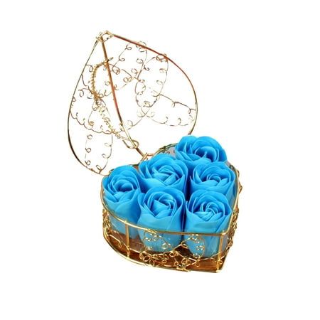 blue roses are in a gold box on a white background with an ornament