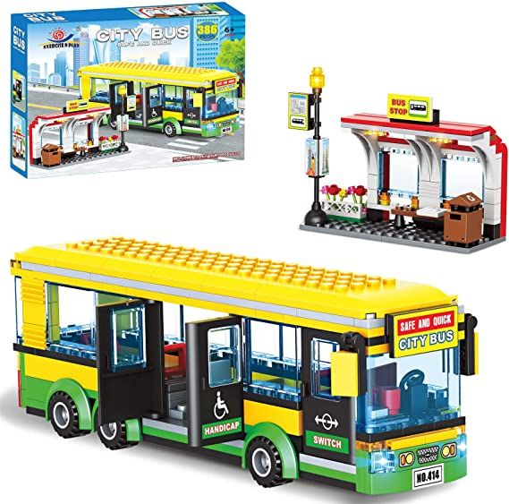 a toy bus is shown with its box and instructions on how to set it up