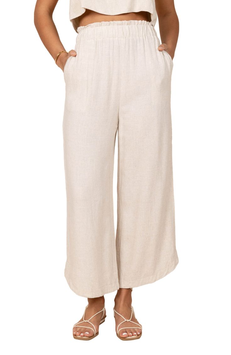 Easy and polished, these elastic-waist pants are crafted from lightweight linen with flowy wide legs. Elastic waist Side pockets Unlined 100% linen Hand wash, dry flat Imported Beige Cropped Wide Leg Pants With Pockets, Beige Wide Leg Cropped Pants With Pockets, Casual Linen Bottoms In Natural Color, Casual Natural Linen Bottoms, Relaxed Beige Linen Bottoms, Solid Linen Pants For Vacation, Spring Beige Flax Bottoms, Flax Linen Beach Bottoms, Flax Linen Trousers