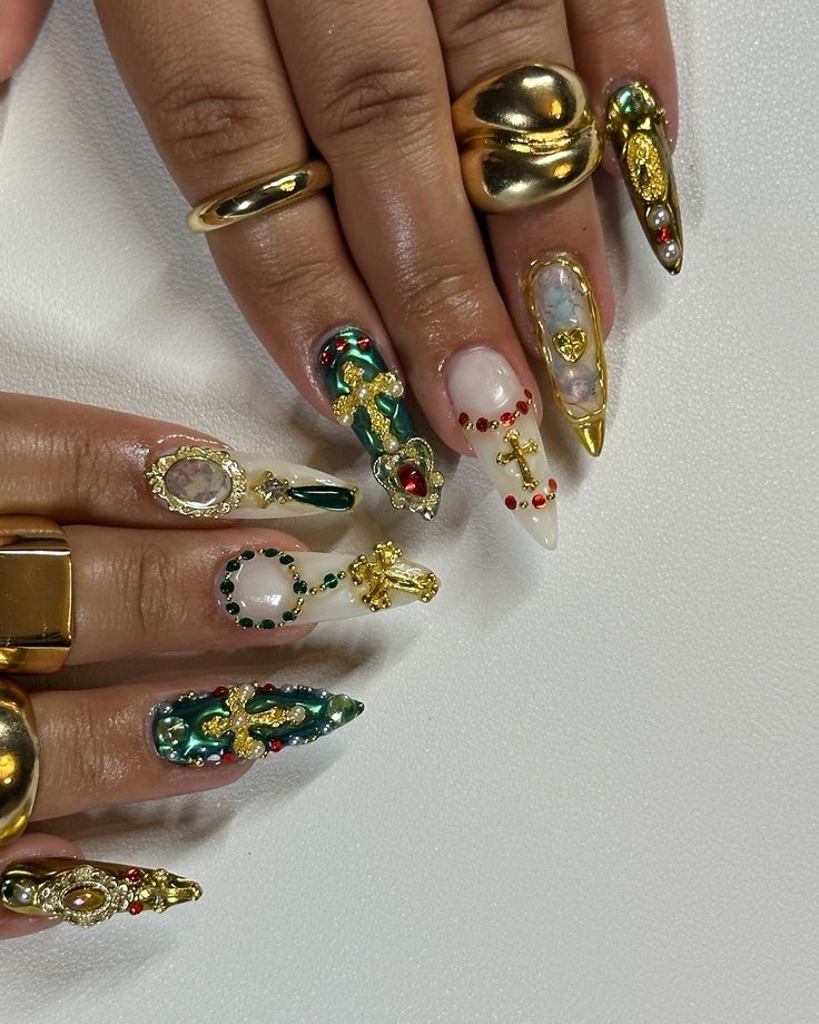 catholic core ⚜️ inspo @nailsbyaleeshah . . . catholic nails, sacred heart nails, religious nails, gold red and green nails, stiletto nails, gel x nails inspo 2024, #nailsnailsnails #nailart #gelxnails #naildesign #gelnails #gelmani #nailsofinstagram #gelx #nailtech #fypシ #explorepage✨ Red Green Gold Nails, Virgen Nails, Green Nails Stiletto, Religious Nails, Sacred Heart Nails, Virgencita Nails, Catholic Nails, Aphrodite Nails, Rosary Nails