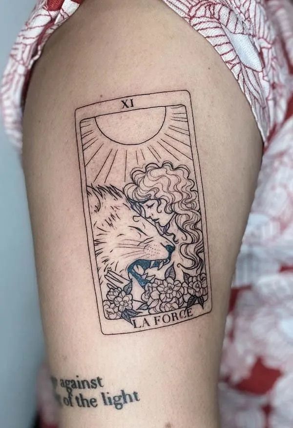 the tarot card tattoo on the arm