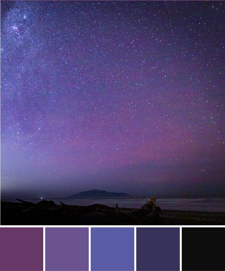 the night sky is filled with stars and purple hues as well as other colors