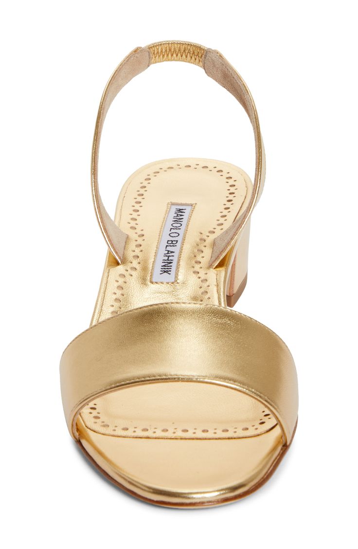 Glimmering golden metallic leather brings the Midas touch to this modern sandal set on a low block heel and secured with a stretchy slingback strap. 1 1/2" heel (38mm) (size 38.5) Elasticized slingback strap Leather upper, lining and sole Made in Italy Designer Shoes Chic Gold Slingback Sandals With Padded Heel, Gold Slingback Sandals With Sculpted Heel, Gold Slingback Sandals For Evening With Padded Heel, Luxury Gold Low Heel Sandals, Luxury Gold Sandals With Low Heel, Gold Leather Slingback Pumps, Chic Gold Slingback Sandals With Block Heel, Gold Leather Slingback Pumps With Ankle Strap, Gold Ankle Strap Slingback Sandals For Evening