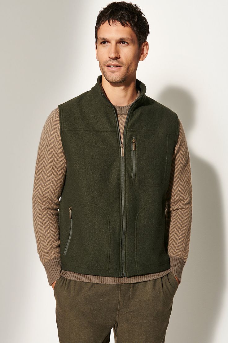 As the summer fades into fall and when the winter melts into spring, your best bet for staying at a perfect level of warmth is the Bruno vest. Crafted from 100% virgin wool from Italy with a soft, lightweight yarn and fine fiber, this zip-front vest is a sporty, versatile companion on your daily errands or weekend adventures. A chest pocket and two side pockets offer handy storage space wherever life takes you. Sleeveless Vest With Zipper For Outdoor Activities, Functional Sleeveless Vest For Layering, Functional Layering Vest, Outdoor Activities Vest With Zipper Closure, Casual Wool Sleeveless Vest, Casual Sleeveless Wool Vest, Casual Wool Vest Outerwear, Casual Sleeveless Wool Outerwear, Functional Fall Vest For Layering