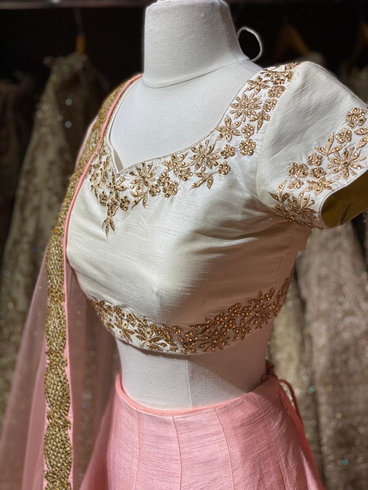 Dusky peach heavy kundan border lehenga with contrasting pearl white floral zardozi embroidery blouse and net border dupatta. Fabric: Raw Silk This outfit can be customized in multiple colors and specific to client measurements. 90 days of production time is required and are for bulk orders only! Orders are processed in store only! Final fittings/alterations not included. Minimum Order Quantity- 4 pieces Designer Raw Silk Lehenga With Pearl Embroidery, Traditional Designer Choli With Pearl Embroidery, Traditional Drape Raw Silk Lehenga With Pearl Embroidery, Traditional Choli With Pearl Embroidery And Drape, Traditional Fitted Lehenga With Pearl Embroidery, Designer Pearl Embroidered Lehenga For Festivals, Peach Traditional Wear With Intricate Embroidery For Wedding, Anarkali Wedding Blouse Piece With Pearl Embroidery, Anarkali Blouse Piece With Pearl Embroidery For Wedding