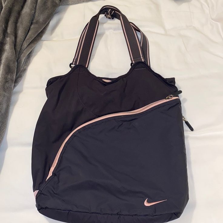 Never Used Nike Sports Bag. It Is Large In Size So A Lot Will Fit In The Bag Functional Pink Gym Bag For Everyday, Functional Pink Gym Bag For Sports, Functional Pink Gym Bag, Sporty Everyday Shoulder Bag, Casual Pink Gym Bag, Sporty Tote Shoulder Bag With Adjustable Strap, Sporty Tote Shoulder Bag With Zipper Closure, Sporty Shoulder Bag For Daily Use, Pink Sporty Travel Bag