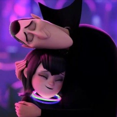 the animated batman and catwoman hug each other