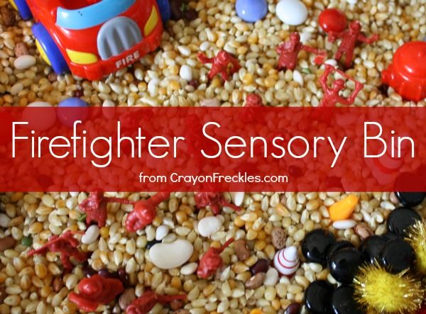 a fire truck and toy cars are in a pile of gravel with the words firefighter sensory bin above it