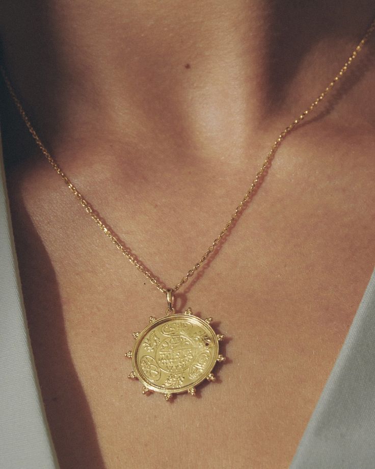 Ottoman sun disc coin pendant necklace in 22k solid gold & diamonds. Shop Temple of the Sun Heritage Collection inspired by ancient Anatolia. Yellow Gold Plated Amulet Coin Necklace, Engraved Yellow Gold Coin Amulet Necklace, Engraved Yellow Gold Coin Necklace, Luxury Yellow Gold Coin Medallion Necklace, Yellow Gold Plated Engraved Coin Necklace, Timeless Gold Engraved Coin Necklace, Engraved Gold Plated Amulet Coin Necklace, Timeless Engraved Gold Coin Necklace, Engraved Yellow Gold-plated Coin Necklace