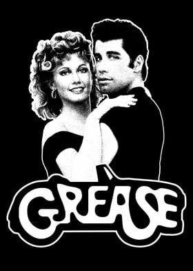 the grease logo on a black shirt with an image of two people standing next to each other