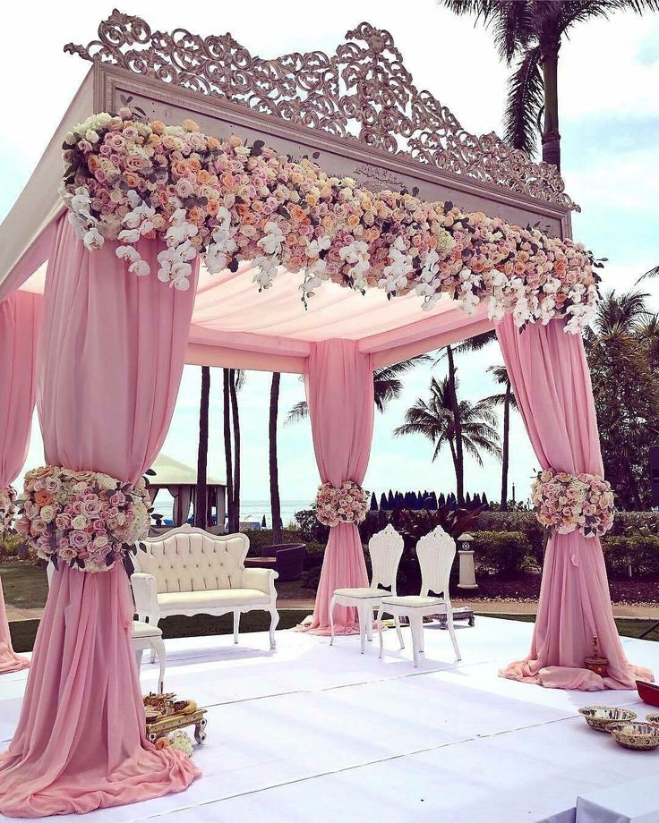 an instagram page for a wedding with pink and white decor