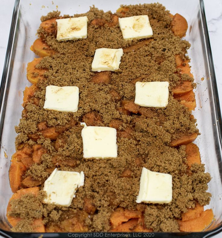 a casserole dish filled with meat and cheese