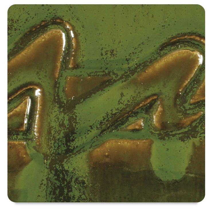 a close up view of green and brown paint