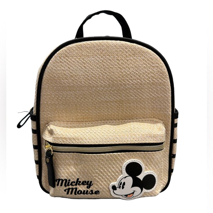 Disney Beige Woven Mickey Mouse Backpack Bag Color: Beige Handle Style: Shoulder Strap Closure: Zip Occasion: Casual Perfect For Traveling Character: Mickey Mouse Front Zip Pocket, Adjustable Strap New With Tags Approx. Measurements: Length: 8" Height: 9.5" Width: 3.5" Disney Mickey Mouse Backpack For Travel, Disney Student Backpack, Disney Minnie Mouse Backpack For Travel, Trendy Mickey Mouse Backpack For Disney Trips, Mickey Mouse Backpack For Travel, Mickey Mouse Everyday Backpack, Trendy Minnie Mouse Backpack For Travel, Trendy Minnie Mouse Travel Backpack, Minnie Mouse Backpack For Travel