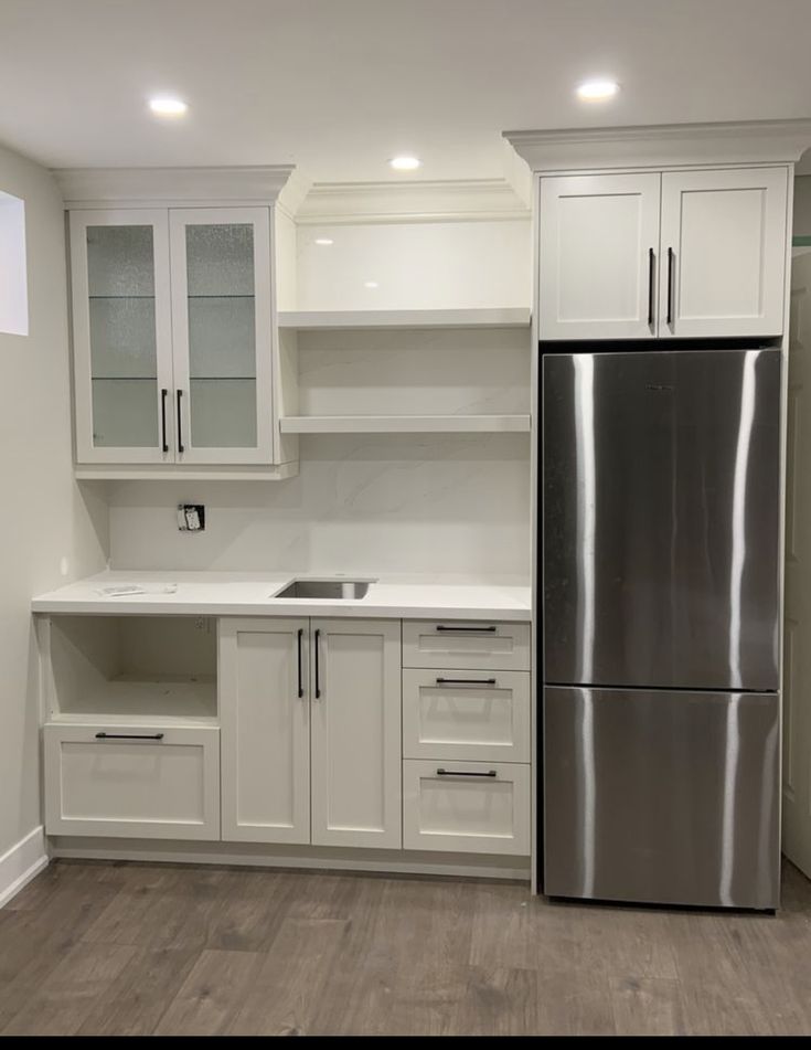 the kitchen is clean and ready for us to use in its new owner's home