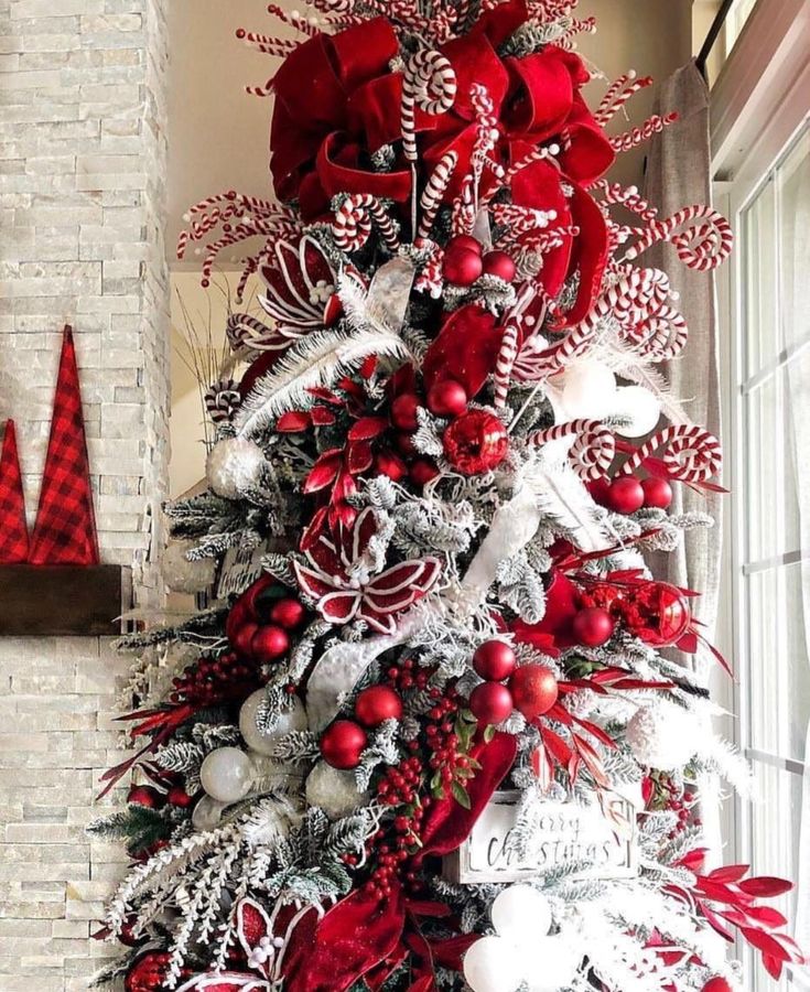 a christmas tree with red and white decorations