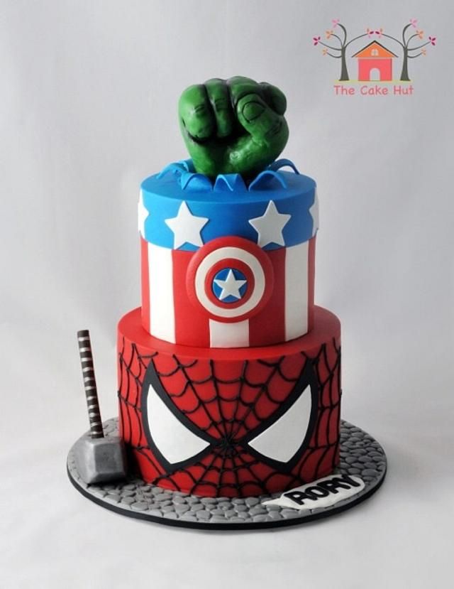 the cake is made to look like captain america's hand and fist on top