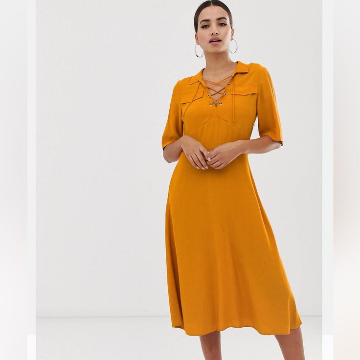 Never Worn. Color Is A Burnt Orangey/Gold Color. Orange Midi Dress For Summer Workwear, Summer Workwear Orange Midi Dress, Summer Orange Midi Dress For Workwear, Orange Knee-length Dress For Work, Orange V-neck Midi Dress For Work, Orange Midi Length Dress For Work, Orange Knee-length Midi Dress For Brunch, Orange Knee-length Midi Dress For Day Out, Vestidos Retro