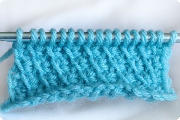 the crochet stitch is being worked on