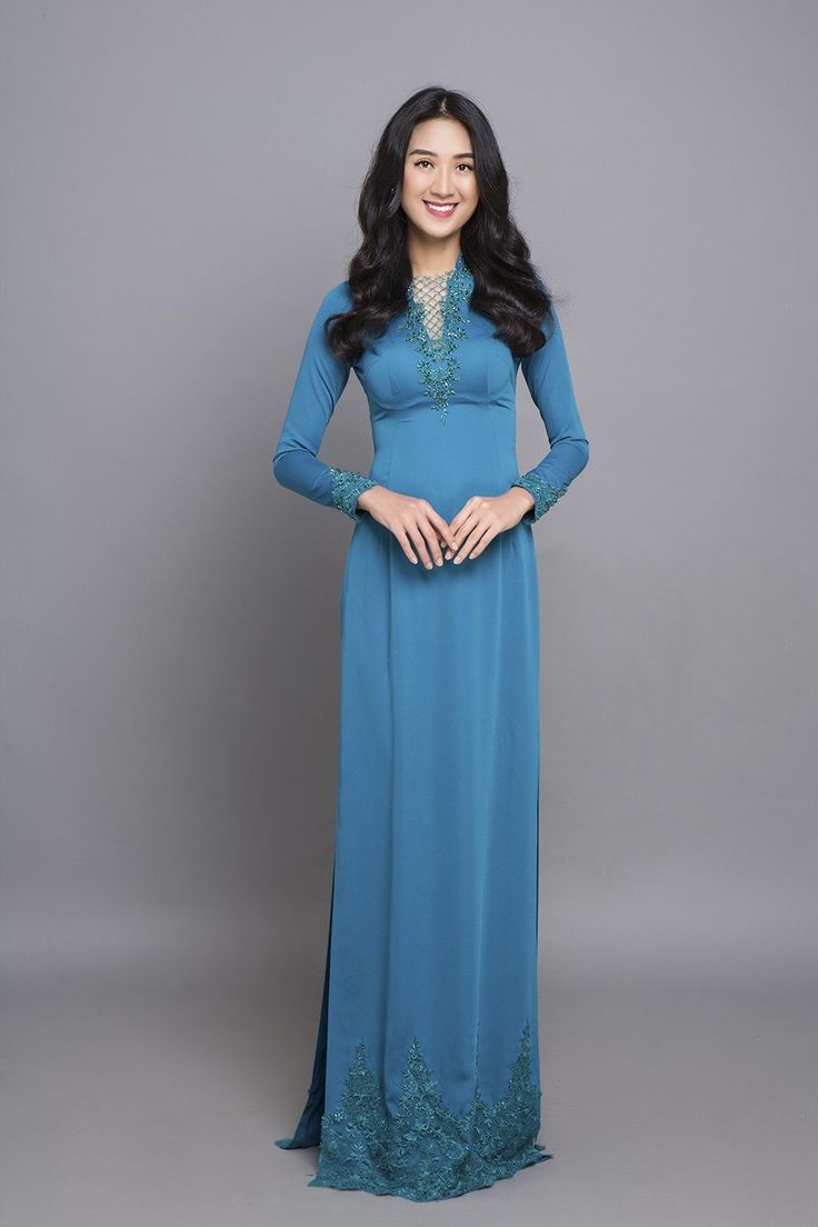 Round neck Fabric: Silk Long sleeves Type: modern ao dai Elegant Formal Ao Dai Maxi Length, Elegant Formal Maxi Length Ao Dai, Elegant Maxi Length Ao Dai For Formal Occasions, Elegant Blue Fitted Ao Dai, Elegant Formal Fitted Ao Dai, Elegant Long Sleeve Ao Dai For Wedding, Elegant Blue Ao Dai For Formal Occasions, Elegant Floor-length Ao Dai For Banquet, Spring Party Cheongsam With Long Sleeves